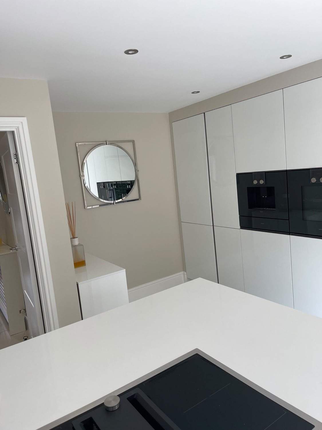 Handleless kitchen decorated by NV Decor Ltd