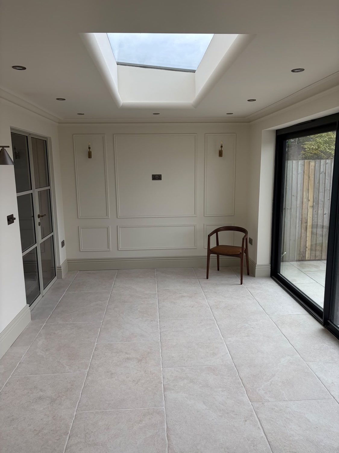 Panelled garden room decorated by NV Decor Ltd